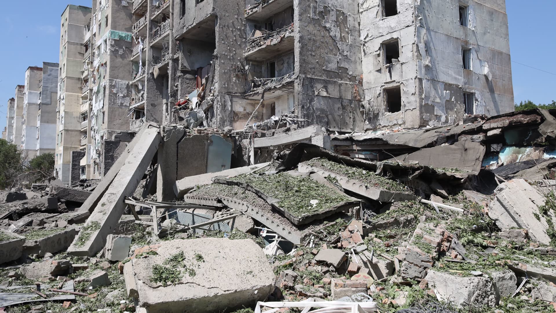 This photograph taken on July 1, 2022, shows a general view of a destroyed building after being hit by a missile strike in the Ukrainian town of Serhiivka, near Odesa, killing at least 20 people and injuring 38.