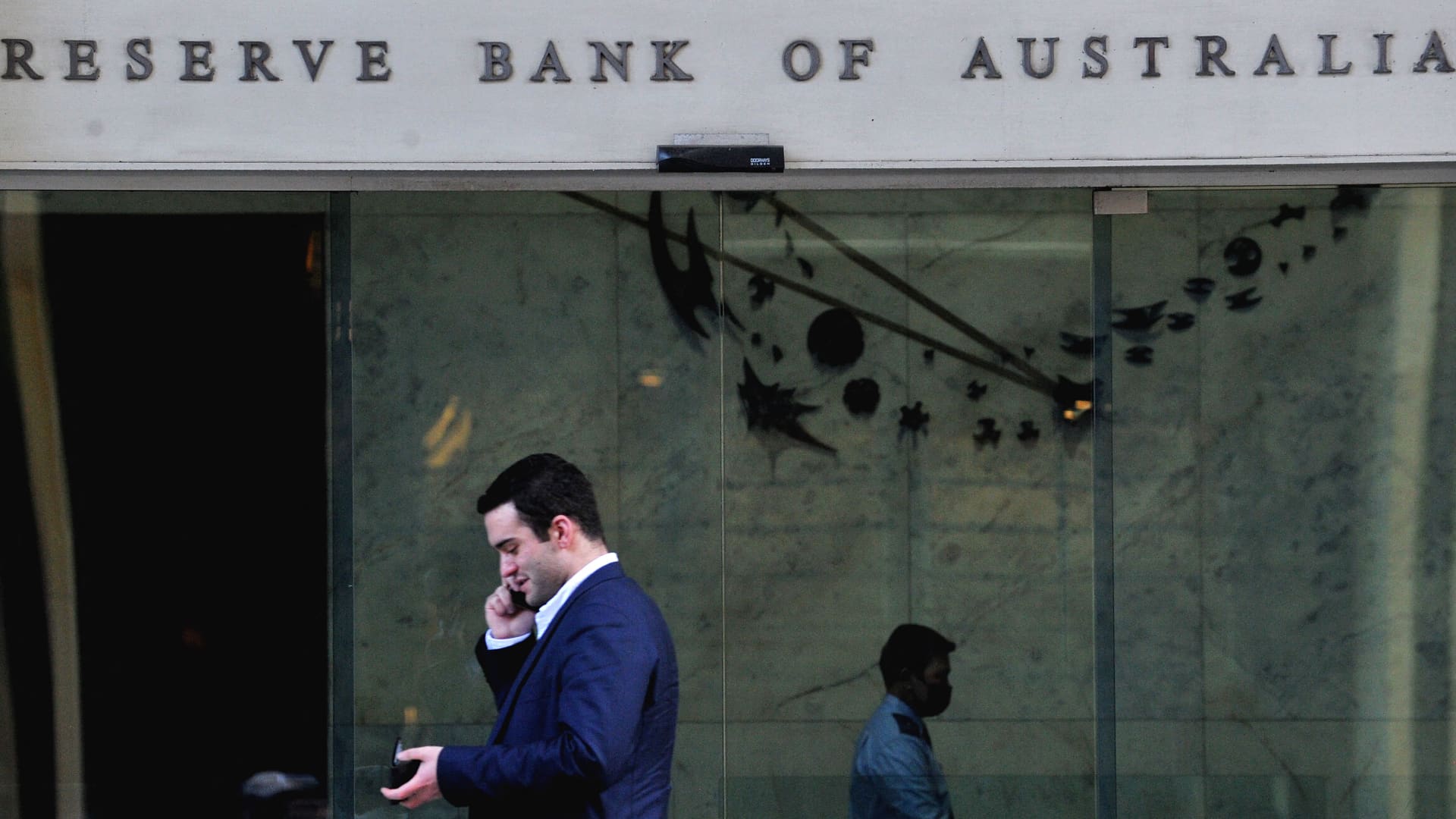 A man walking past the Reserve Bank of Australia in the central business district of Sydney on June 7, 2022.