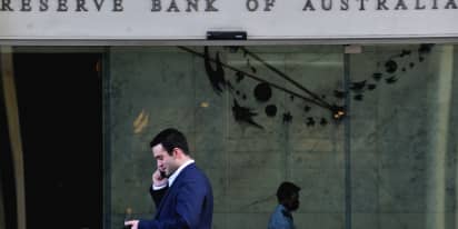 Australia's central bank warns economy to slow sharply as inflation soars