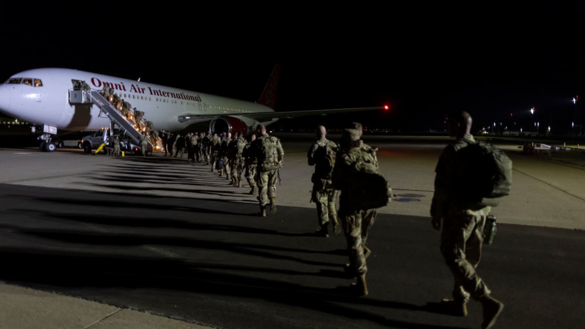 Members of the U.S. Army 2nd Brigade Combat Team depart for their deployment in Europe on July 7, 2022 in Fort Campbell, Kentucky. 