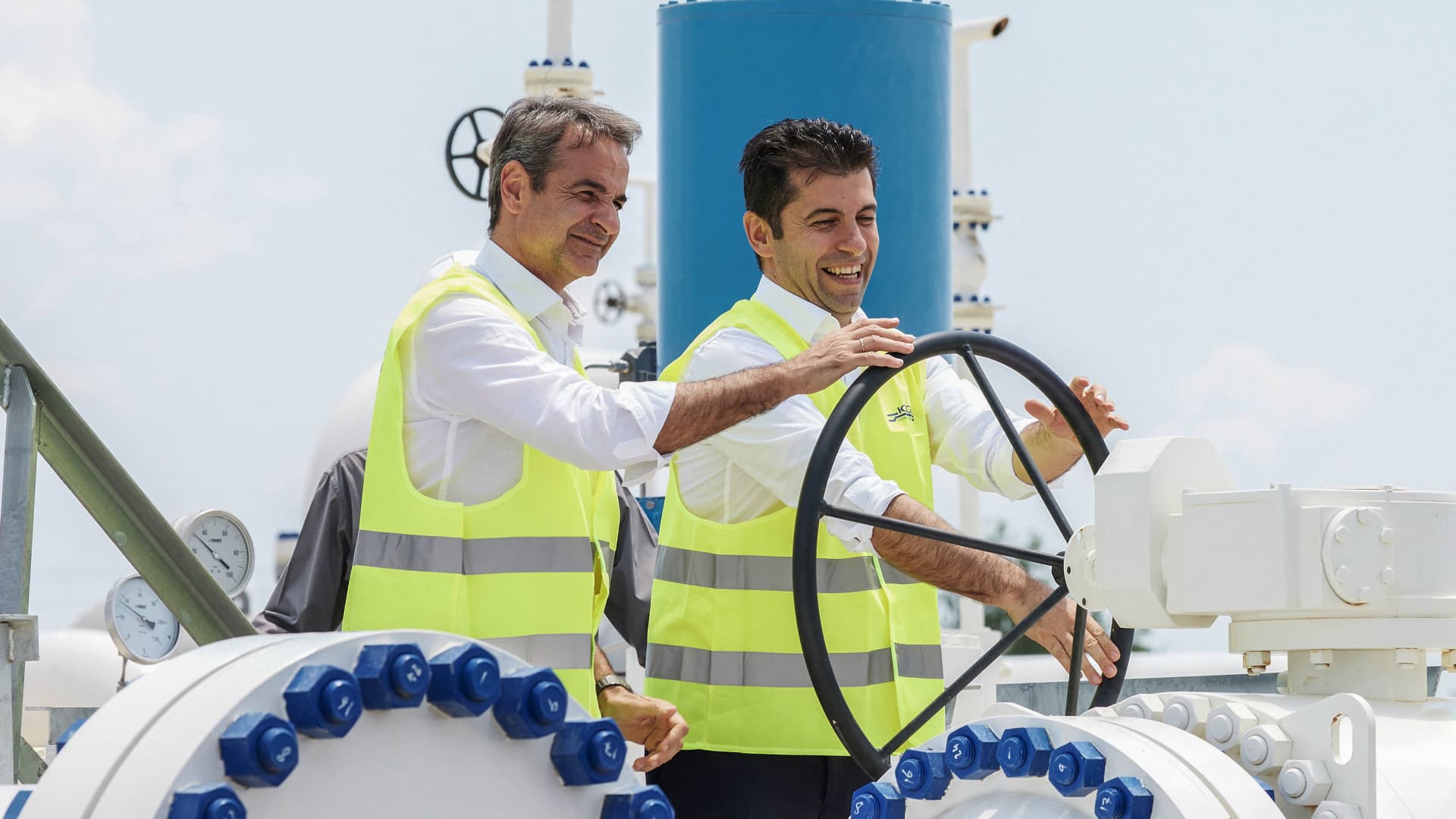 Greek Prime Minister Kyriakos Mitsotakis (L) and his Bulgarian counterpart Kiril Petkov take part in the inauguration ceremony of the Interconnector Greece-Bulgaria (IGB) gas pipeline, in Komotini, northern Greece, on July 8, 2022.