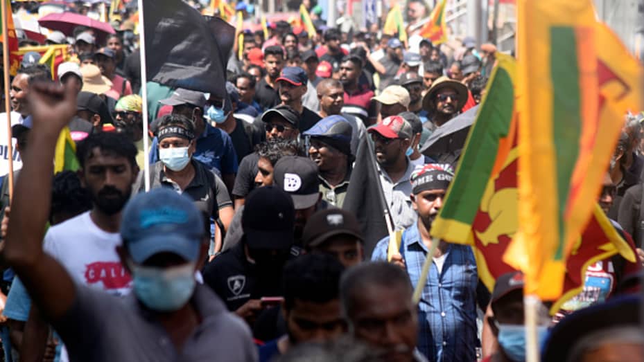 People march in Colombo on July 9, 2022 to protest the ongoing economic crisis in Sri Lanka.