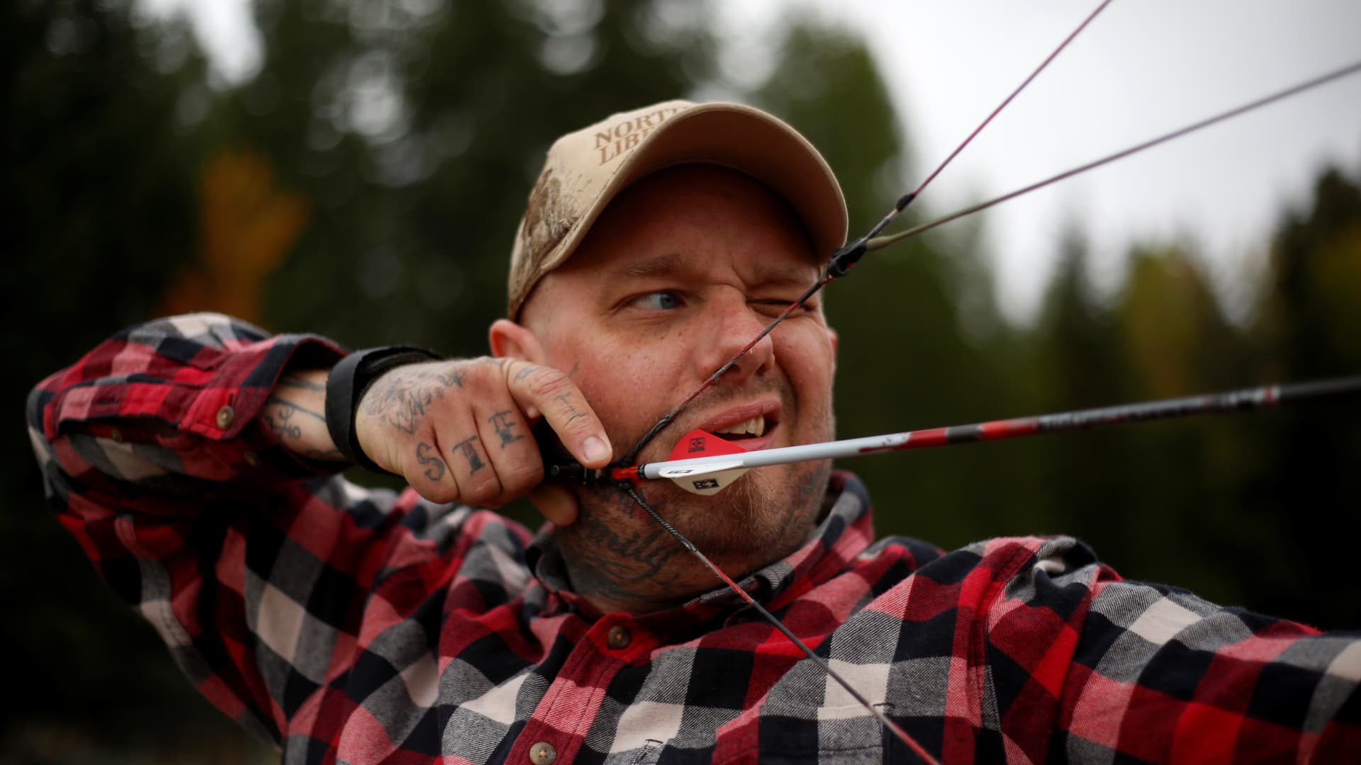 Jason Van Tatenhove, a member of the Oath Keepers, practices archery at his home in northern Montana, U.S. September 25, 2016.