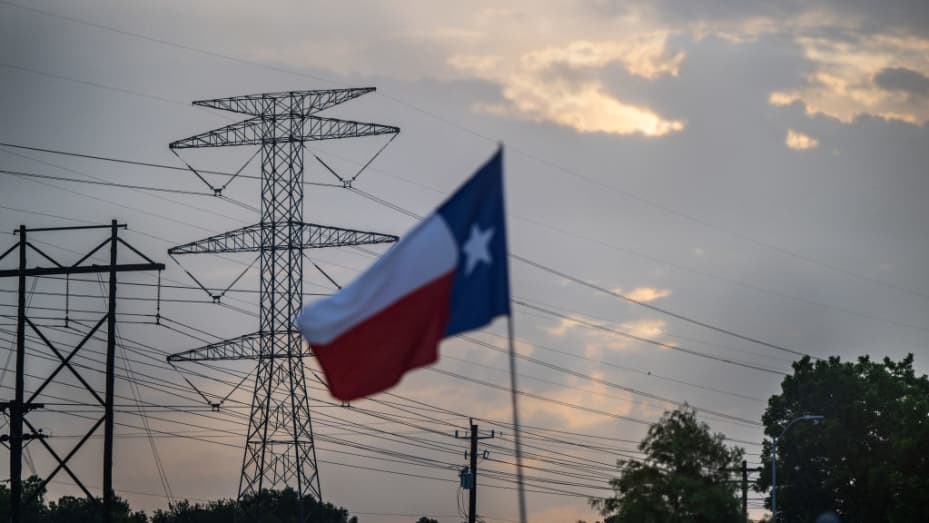 A transmission tower is seen on July 11, 2022 in Houston, Texas. ERCOT (Electric Reliability Council of Texas) is urging Texans to voluntarily conserve power today, due to extreme heat potentially causing rolling blackouts.
