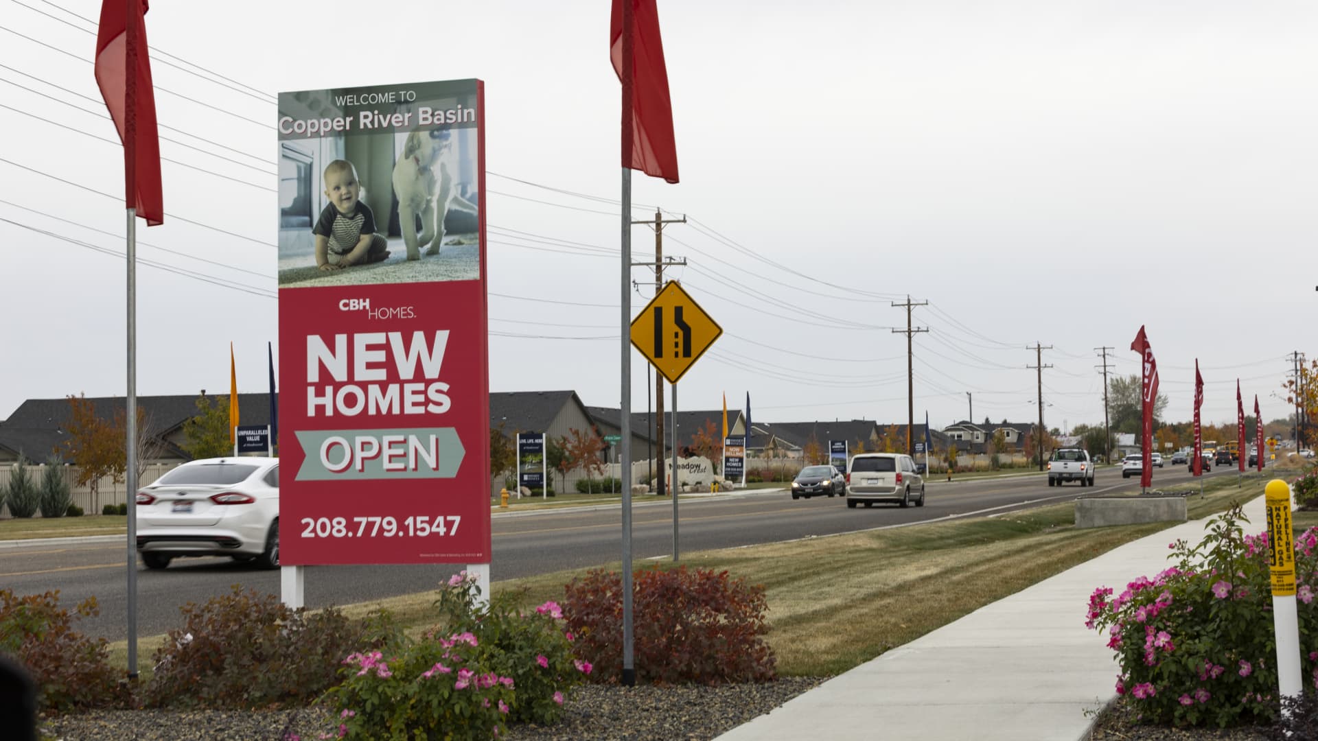 A 'New Homes' sign near the CBH Homes Copper River Basin Community in Nampa, Idaho, Oct. 19, 2021.