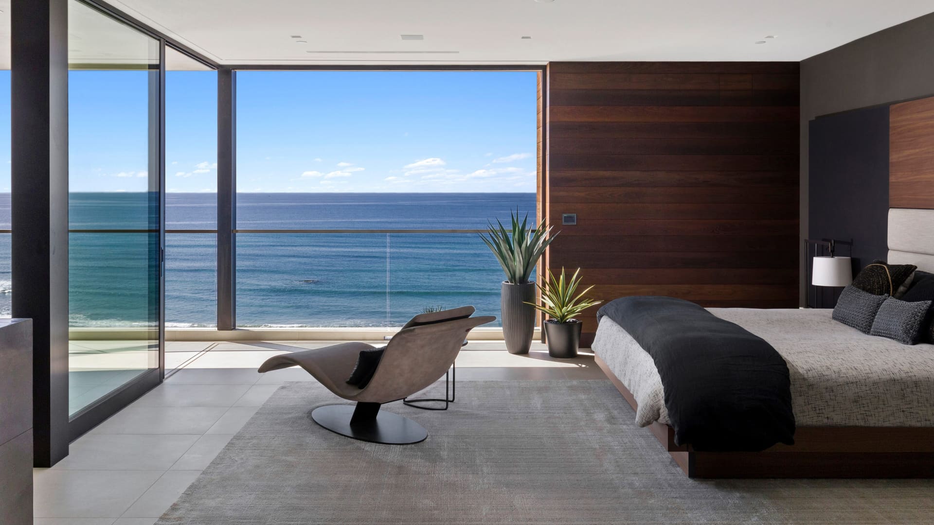 One of Ora House's five bedrooms with an ocean view.