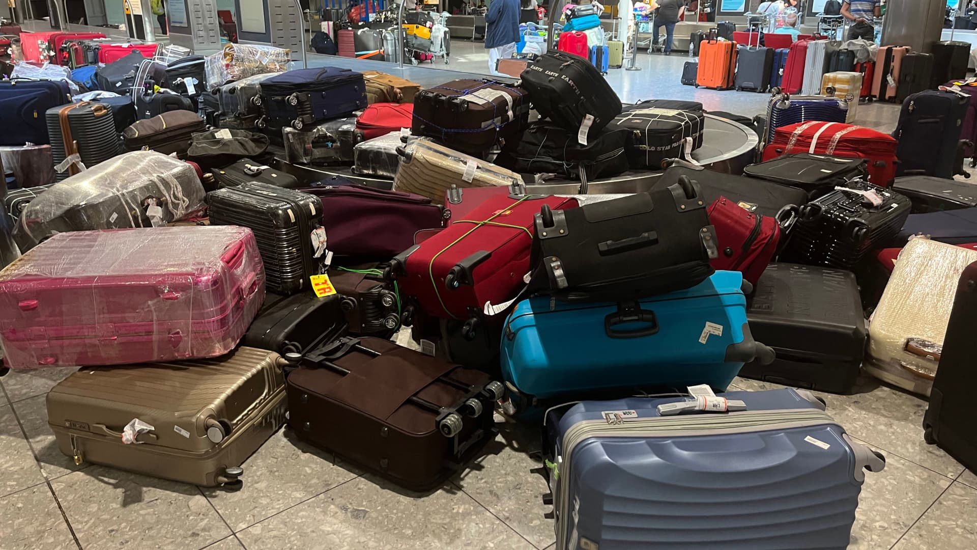 Uncollected suitcases at Heathrow Airport. The U.K.'s biggest airport has told airlines to stop selling summer tickets.
