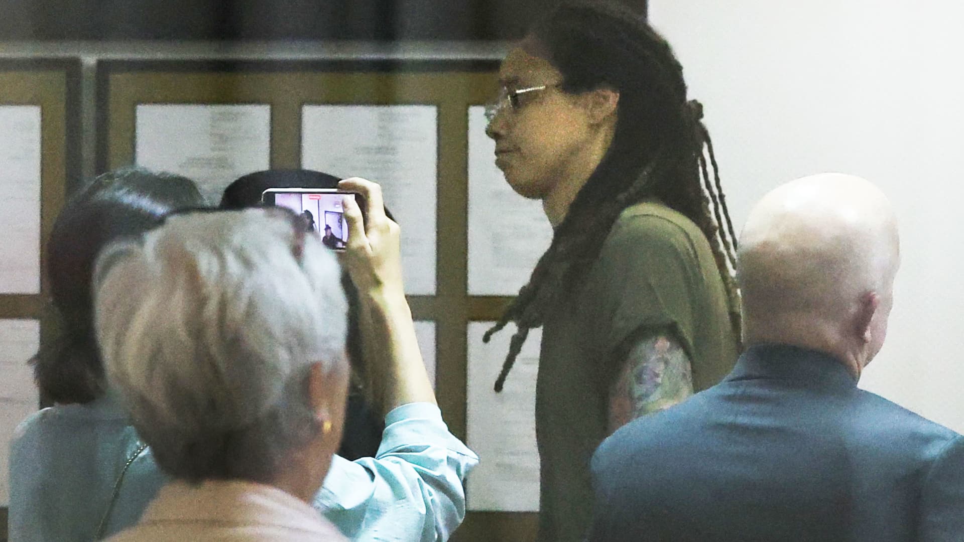 U.S. basketball player Brittney Griner, who was detained in March at Moscow's Sheremetyevo airport and later charged with illegal possession of cannabis, is escorted before a court hearing in Khimki outside Moscow, Russia, July, 14, 2022.