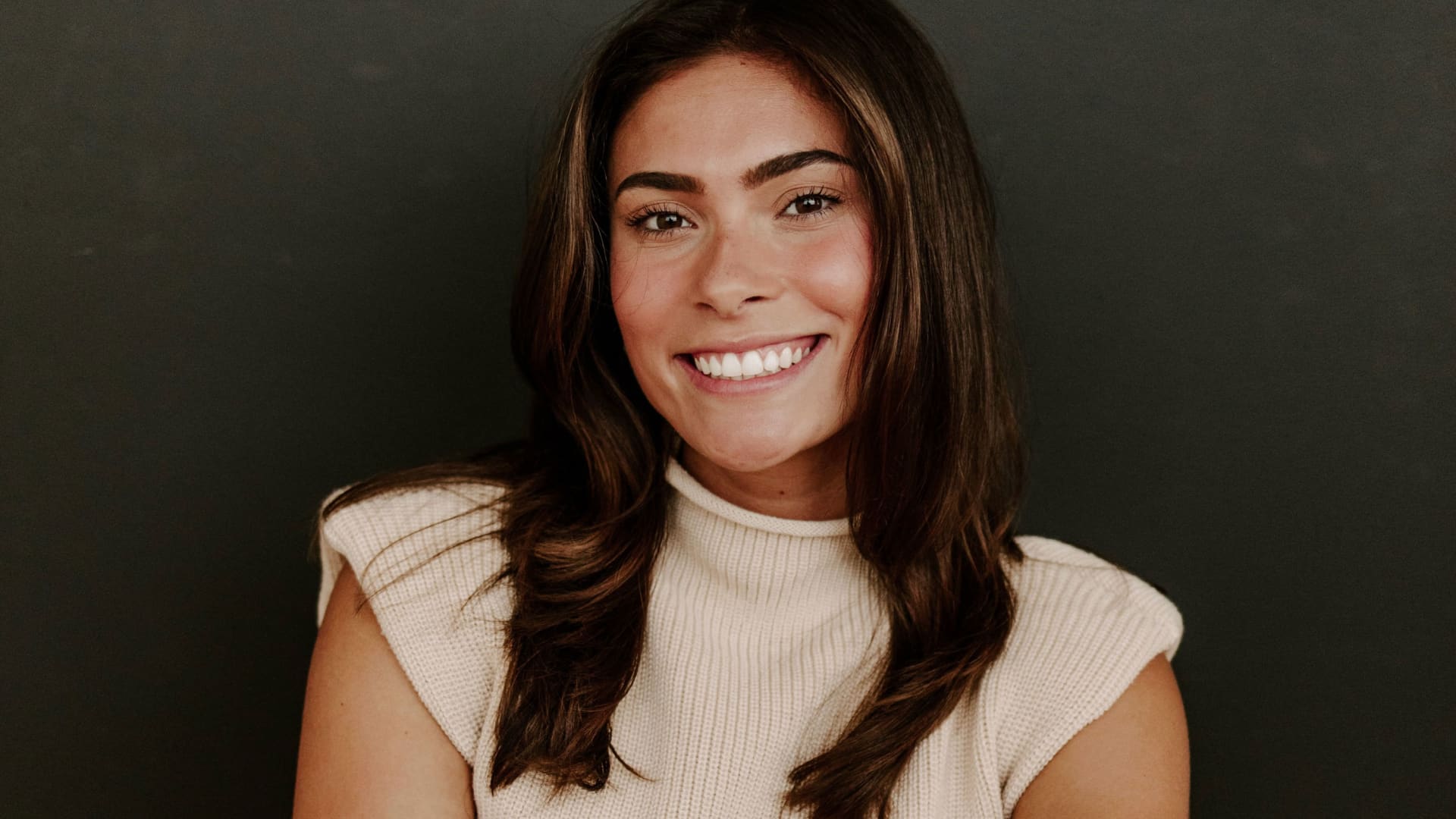 Lucia Cannata, a 2022 graduate from John Carroll University in Cleveland, Ohio and a real estate agent for Howard Hanna.