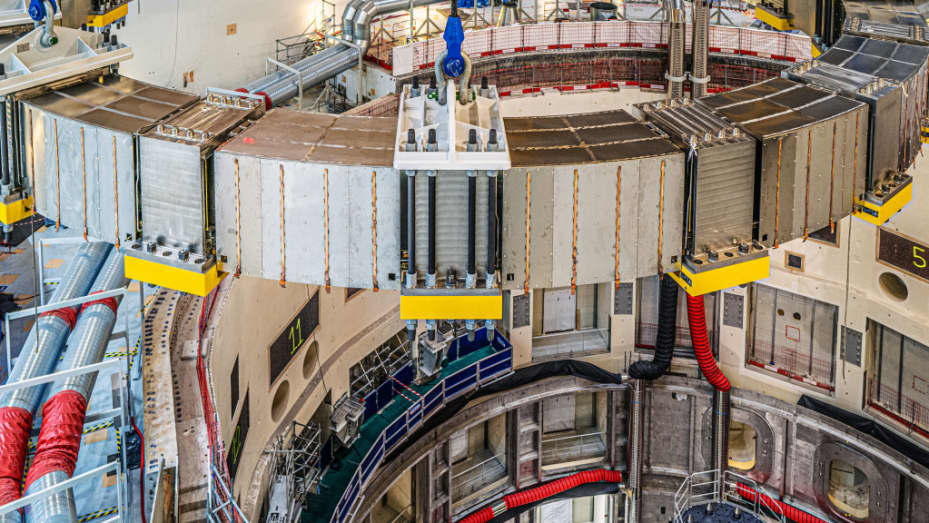 Installation of one of the giant 300-tonne magnets that will be used to confine the fusion reaction during the construction of the International Thermonuclear Experimental Reactor (ITER) on the Cadarache site on September 15, 2021.