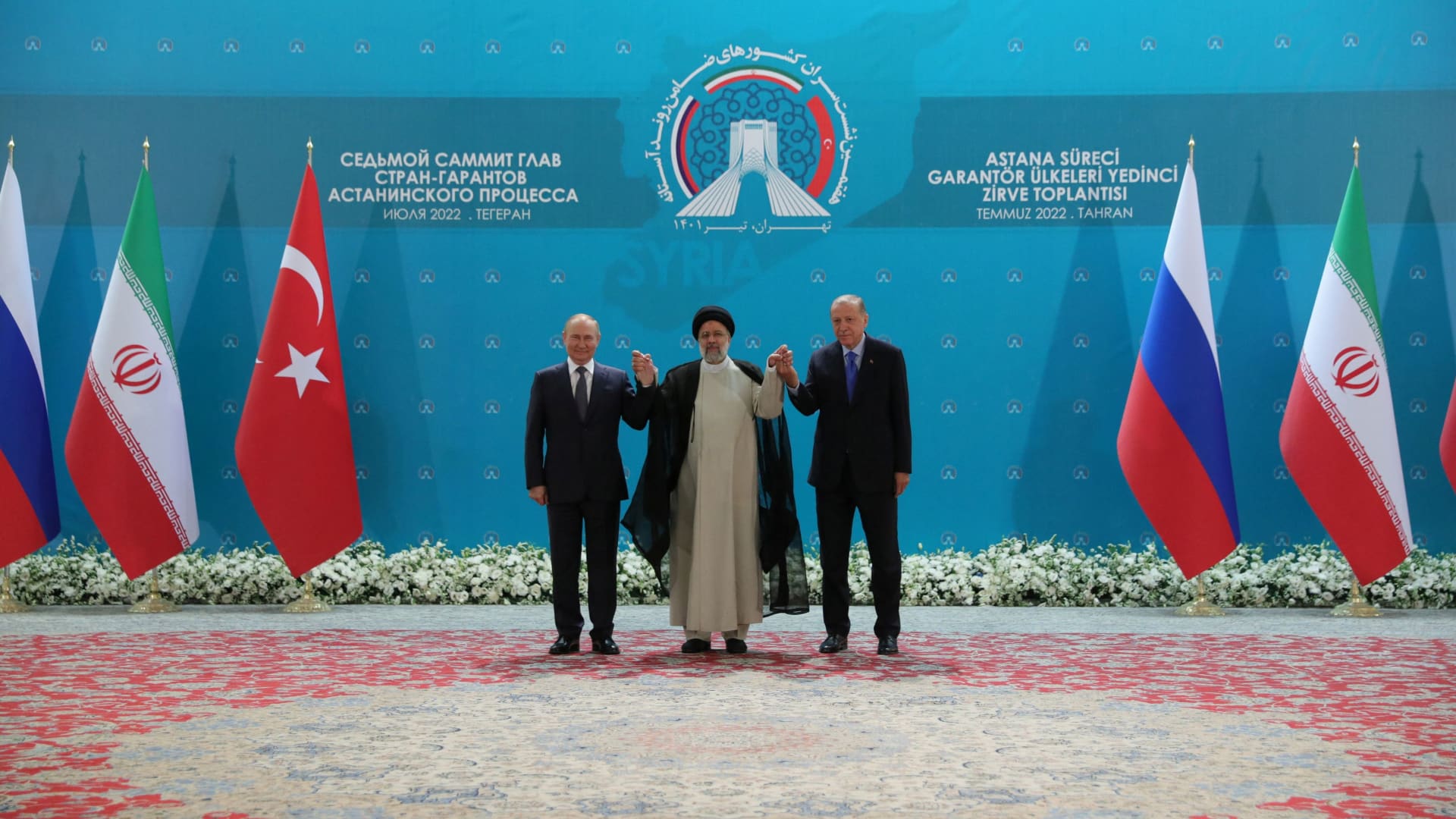 Russian President Vladimir Putin, Iranian President Ebrahim Raisi and Turkish President Tayyip Erdogan meet in Tehran, Iran July 19, 2022. 