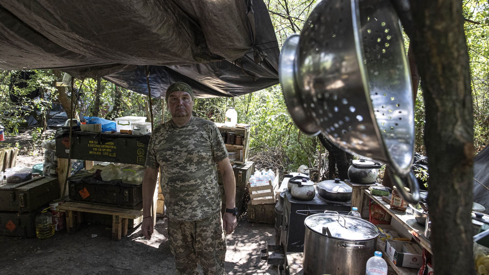 Valodya, a 49-year-old man, volunteers as a cook for Ukrainian soldiers in Kherson, Kherson Oblast, Ukraine on July 15, 2022. 
