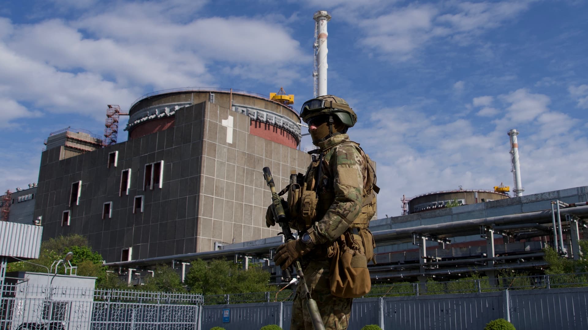 A Russian serviceman patrols the territory of the Zaporizhzhia Nuclear Power Station in Energodar on May 1, 2022. The Zaporizhzhia Nuclear Power Station, seized by Russian forces in March, is in southeastern Ukraine and is the largest nuclear power plant in Europe and among the 10 largest in the world. This picture was taken during a media trip organised by the Russian army.