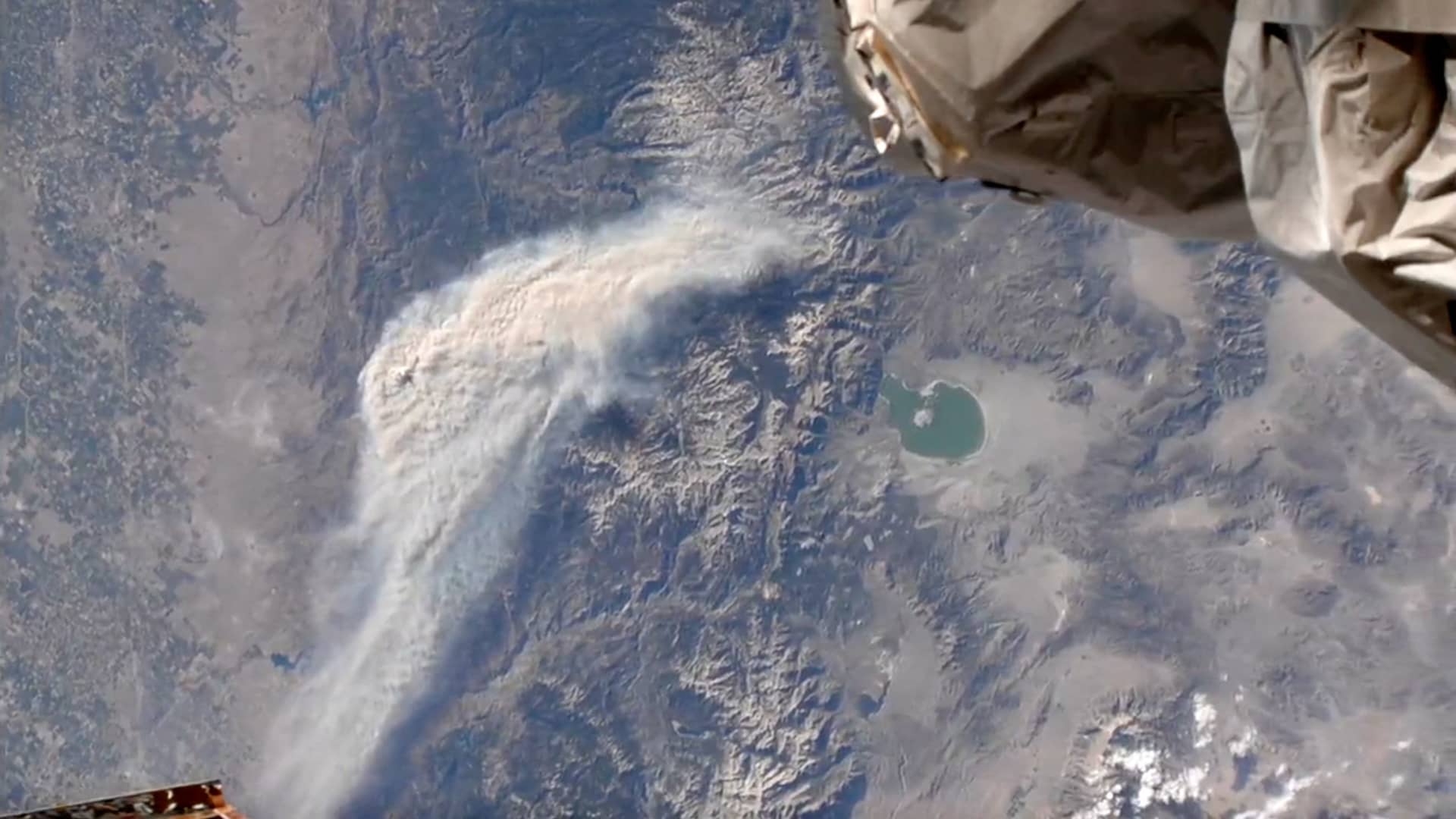 An aerial view from the International Space Station of the Oak Fire near Yosemite National Park, taken from above Yosemite Valley, California, U.S., July 22, 2022, in this screen grab taken from a handout video.