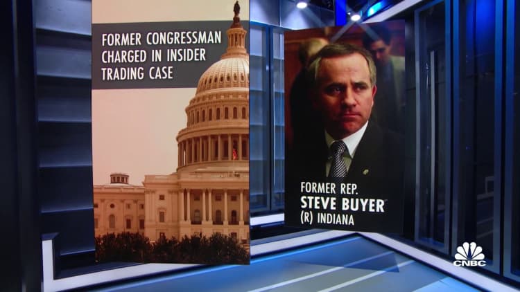 Former Republican congressman charged in insider trading case