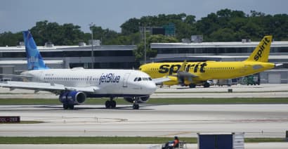 Justice Department sues to block JetBlue’s acquisition of Spirit Airlines