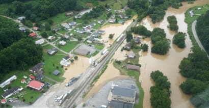 Some Appalachia residents begin cleanup after deadly floods