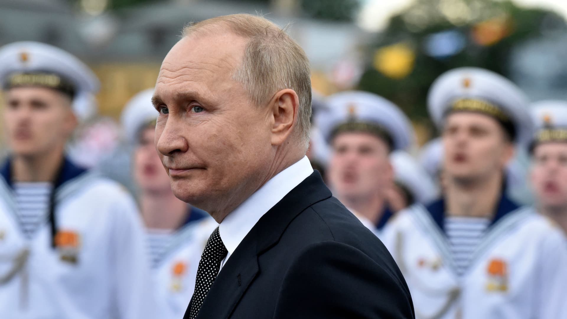 Russia's President Vladimir Putin reviewing naval troops as he attends the main naval parade marking the Russian Navy Day, in St. Petersburg on July 31, 2022.