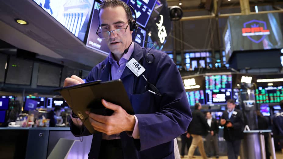 A trader works on the trading floor at the New York Stock Exchange (NYSE) in New York, August 3, 2022.