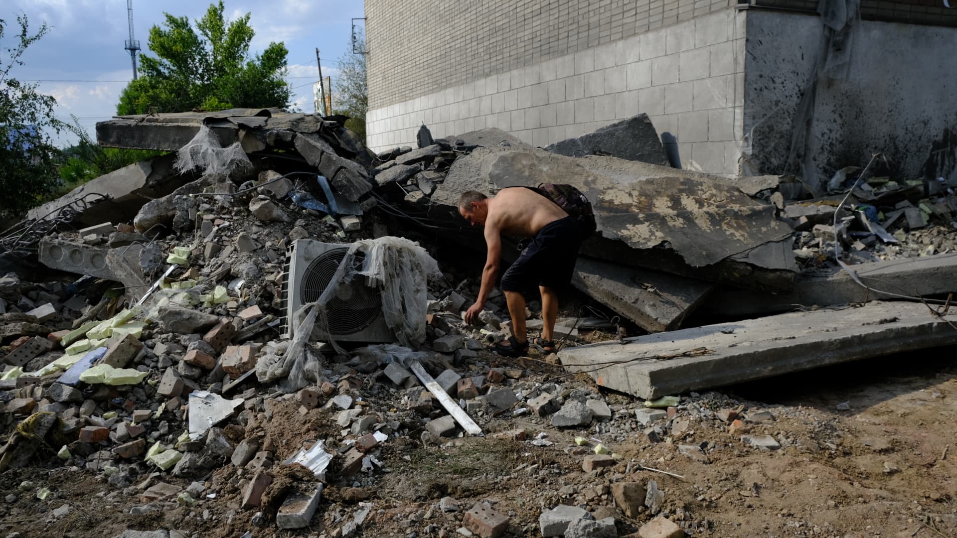 Toretsk, in the Donetsk Oblast of Ukraine, was targeted previously by Russian forces. Here, local residents search for their belongings amid rubbles of a building damaged in an attack by Russian forces on the city on July 28, 2022.