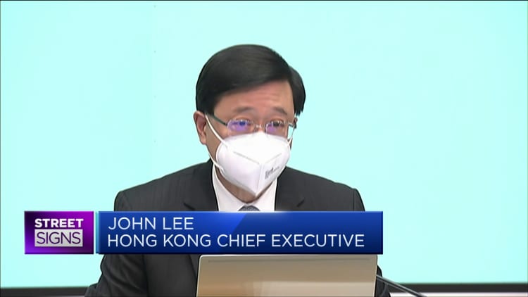 Hong Kong cuts hotel quarantine for overseas visitors to three days