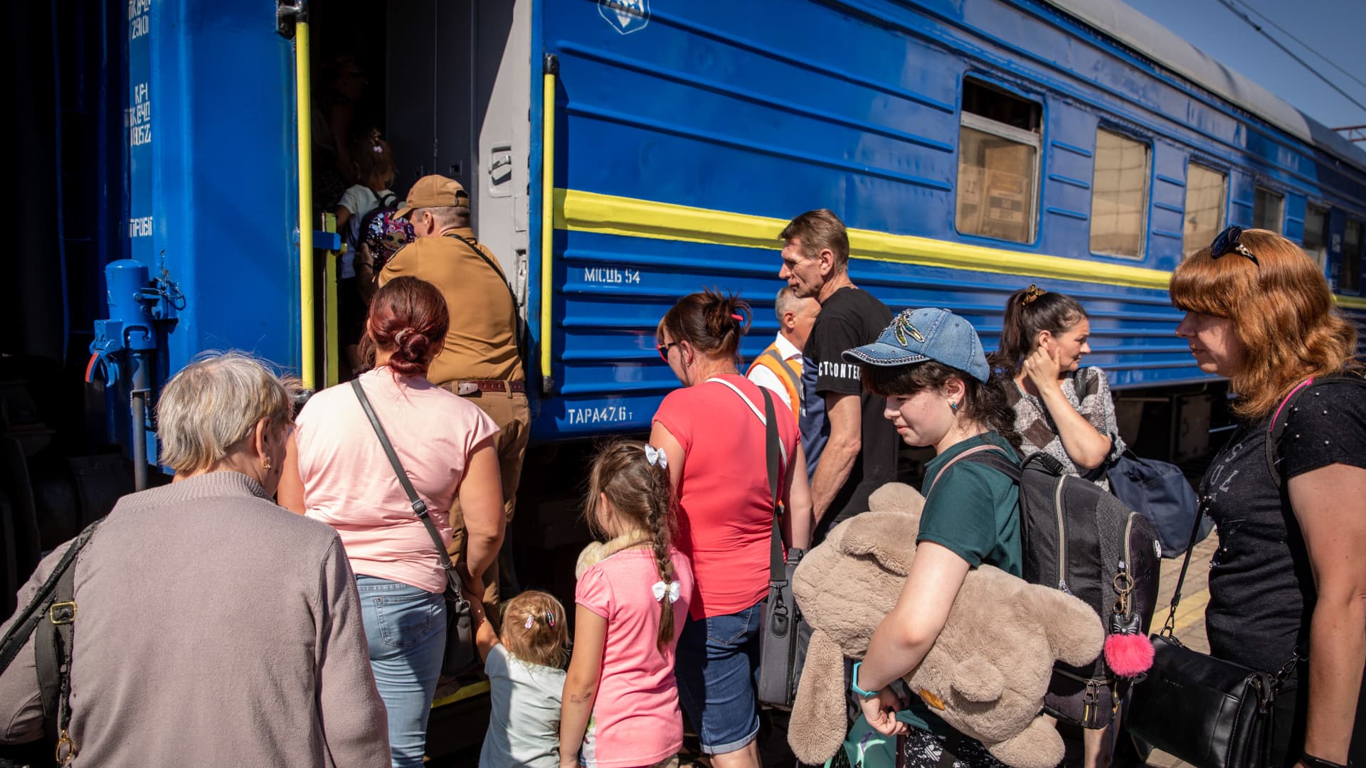 Civilians board the evacuation train in Pokorvsk, amid the intensified fighting in the Eastern part of Ukraine.