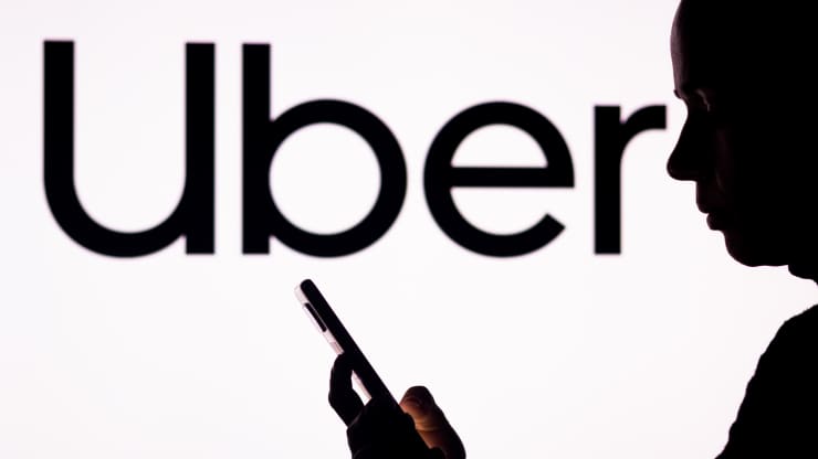 Japanese giant SoftBank dumps its entire stake in Uber as losses mount at its investment unit