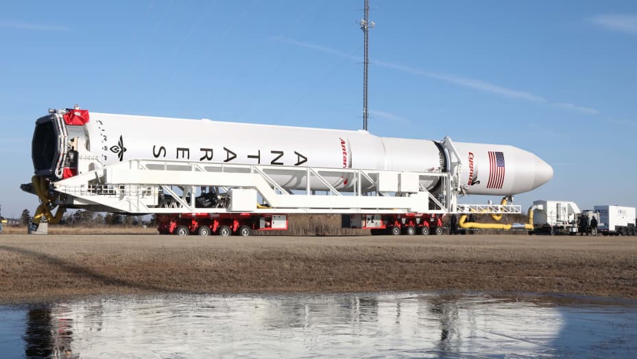 A rendering of an Antares 330 rocket on the way to the launchpad.