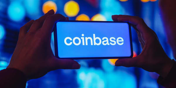 Sell Coinbase as rising competition and macro pressures will hurt the stock, Wells Fargo says