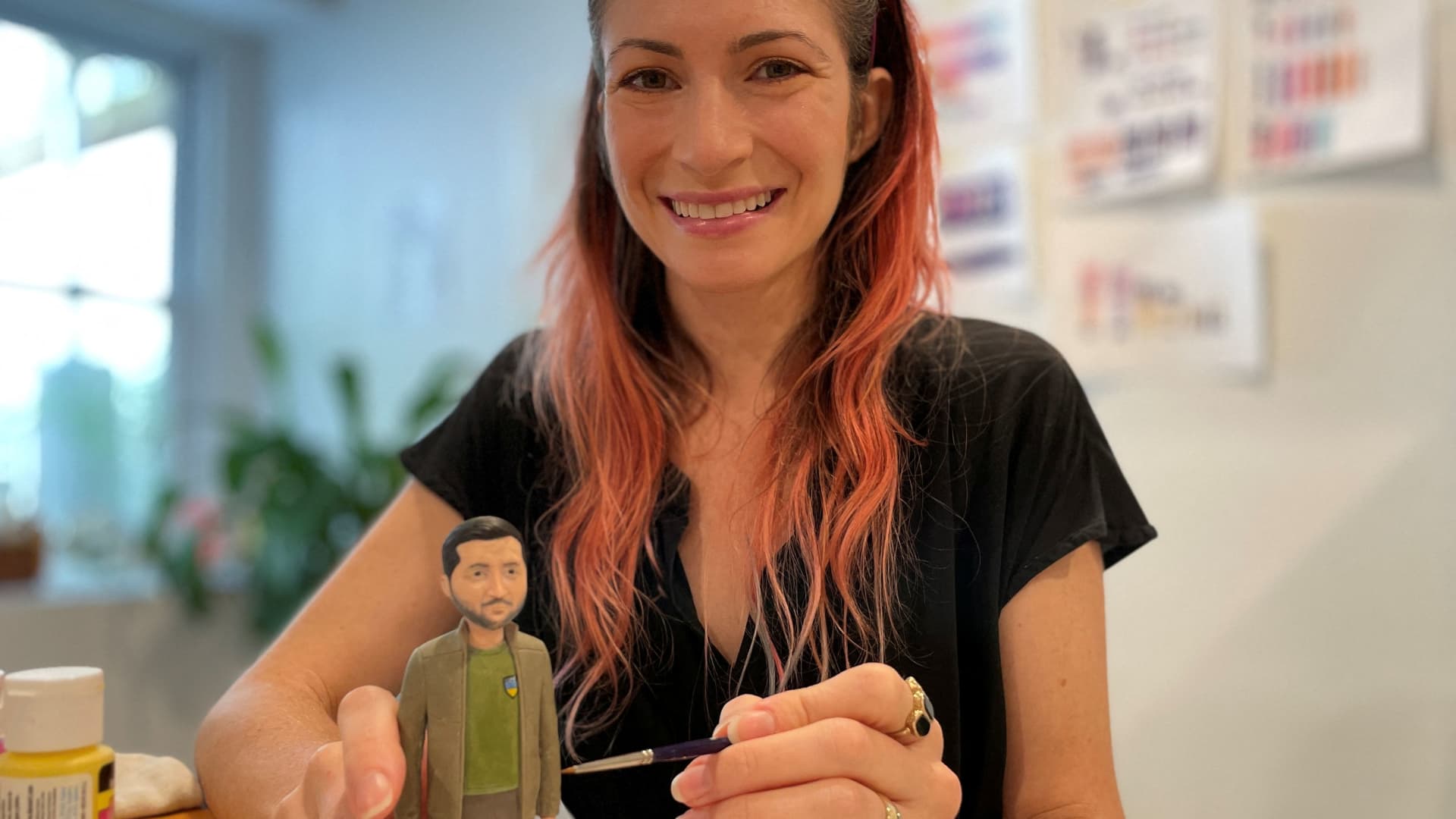 Alyssa Zeller Feinberg, FCTRY chief design officer, with a prototype of the Zelenskyy action figure in Brooklyn, NY, August 9, 2022. 