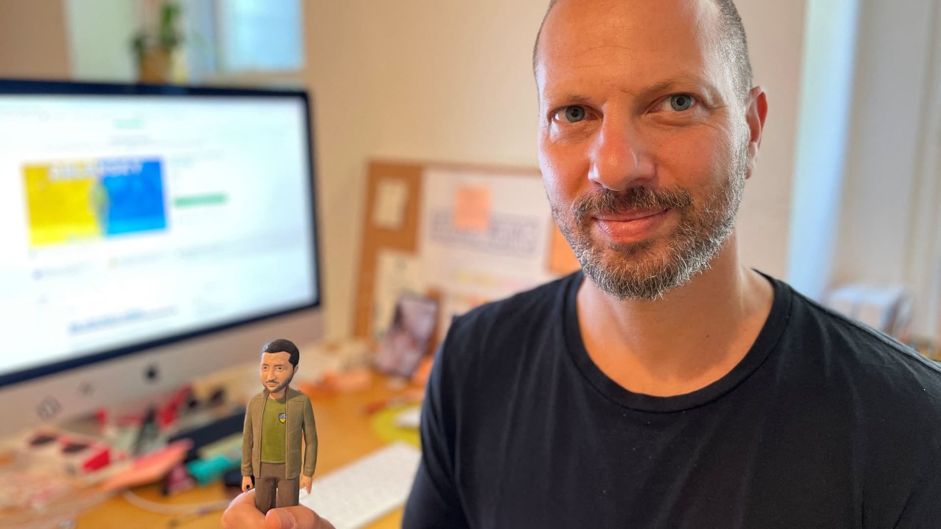 Jason Feinberg, FCTRY CEO & creative director, with a prototype of the Zelenskyy action figure in Brooklyn, NY, August 9, 2022. 