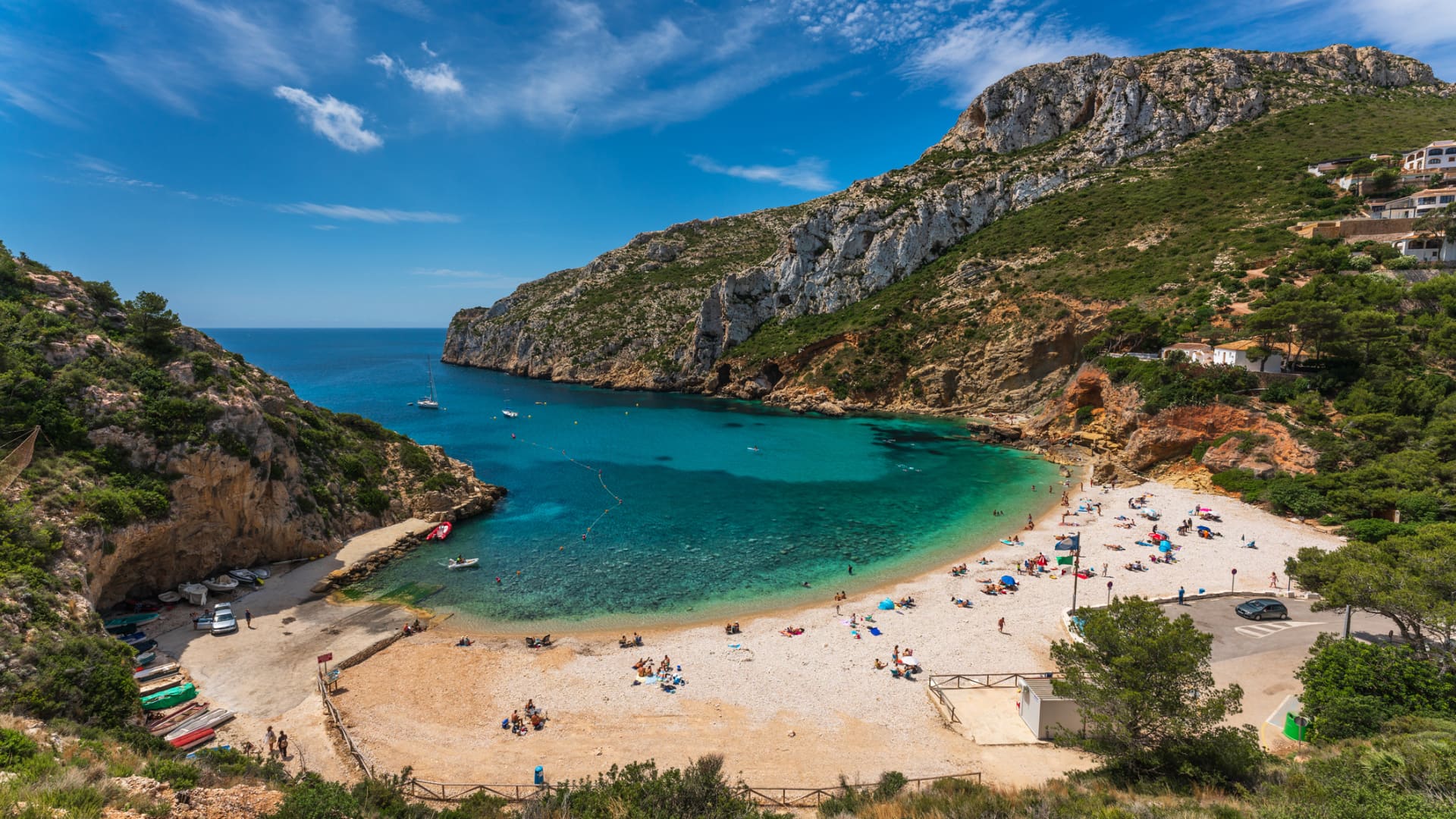 The beach cove Cala Granadella in Alicante is popular with Spanish people. Locals advise going early in the morning or off-season to avoid crowds.