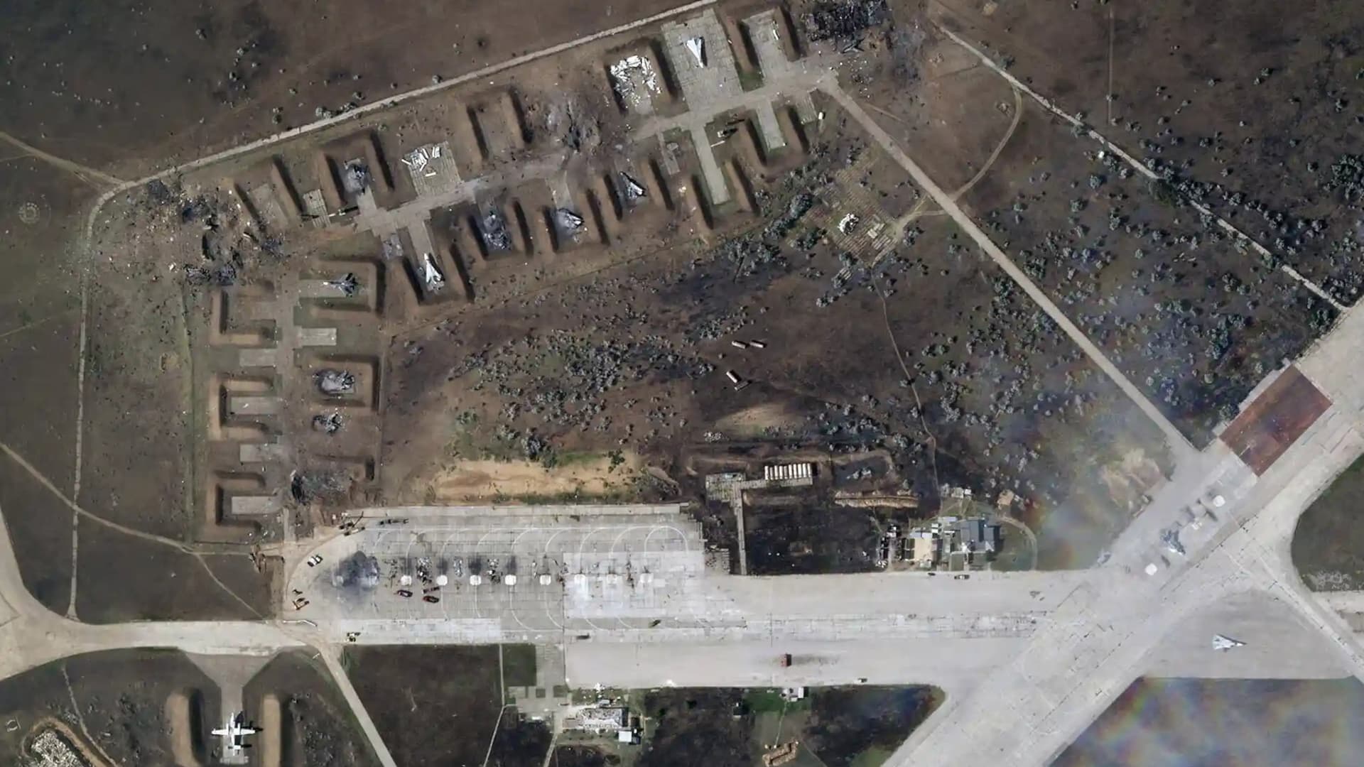 A satellite image provided by Planet Labs shows destroyed Russian aircraft at Saky airbase in Crimea after an explosion on Aug. 9th, 2022.