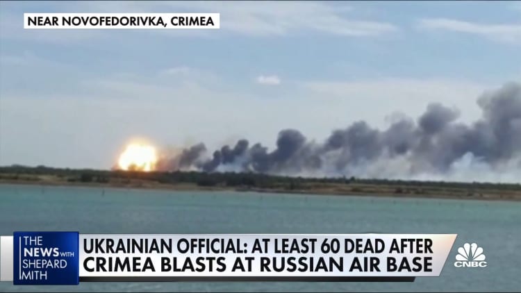 Ukrainians say at least 60 dead after blasts at air base in Crimea