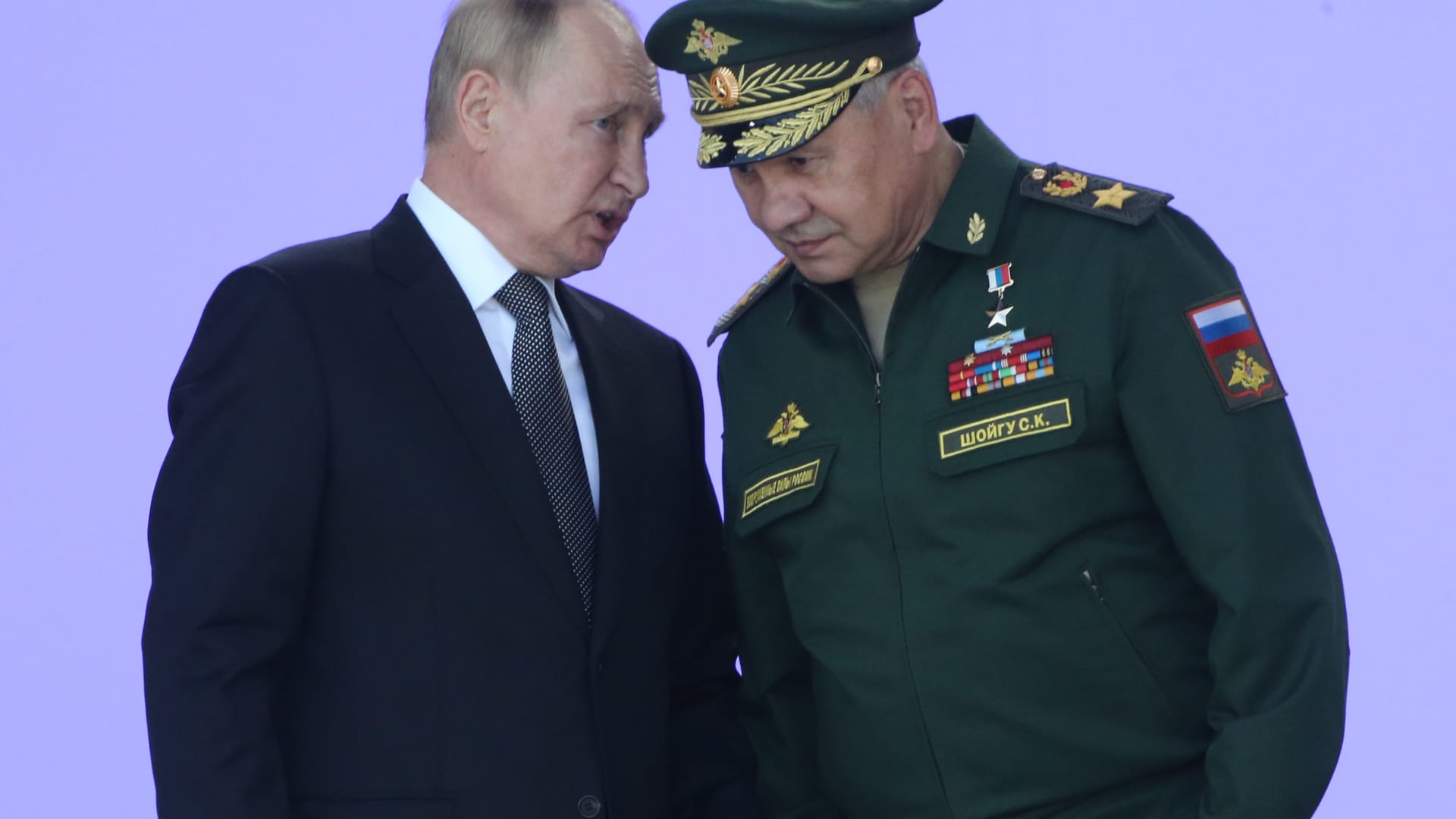 Russian President Vladimir Putin (L) talks to Defence Minister Sergei Shoigu (R) during the opening ceremony of the International Military Technical Forum 'Army 2022', on August 15, 2022, in Kubinka, outside of Moscow, Russia.