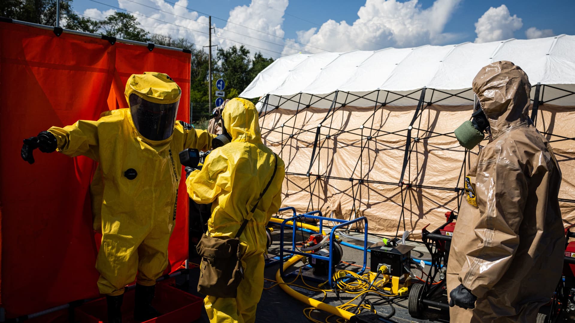 Ukrainian Emergency Ministry rescuers attend an exercise in the city of Zaporizhzhia on August 17, 2022, in case of a possible nuclear incident at the Zaporizhzhia nuclear power plant located near the city. 