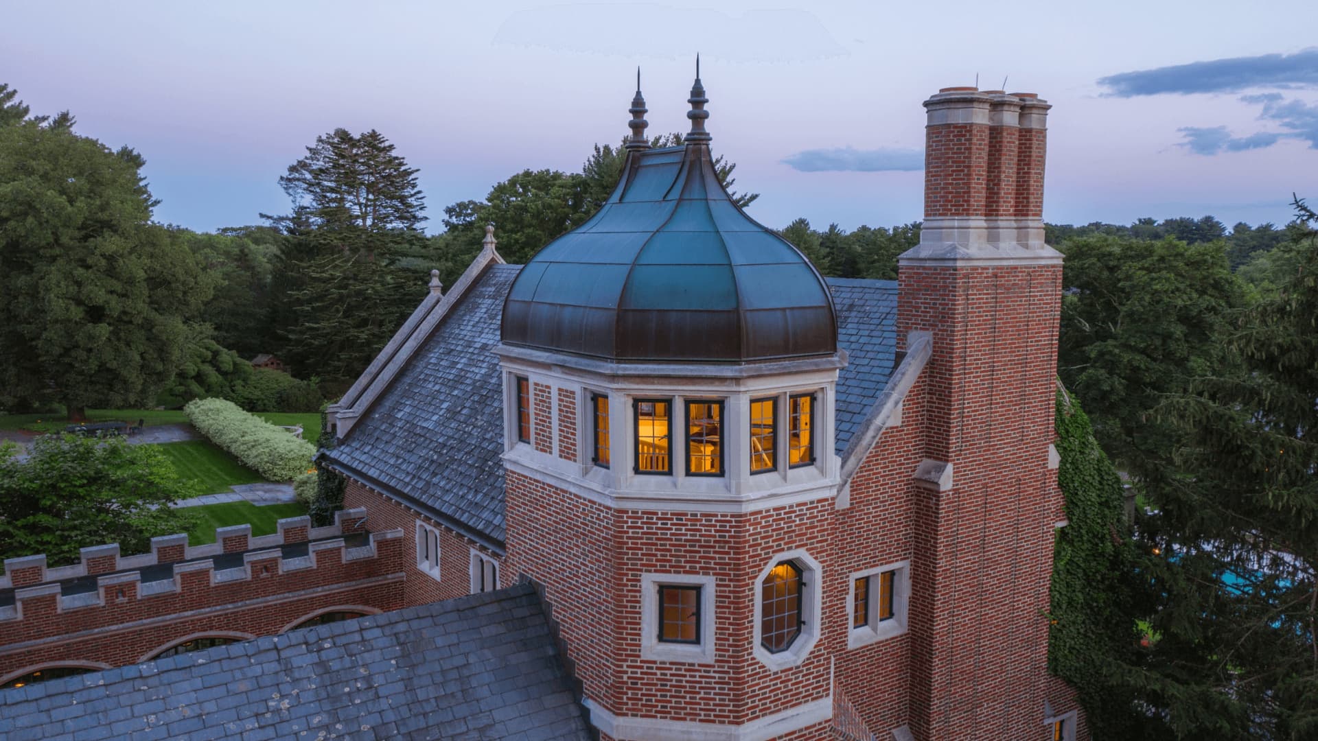 A circular staircase leads to the top of the home's windowed turret.