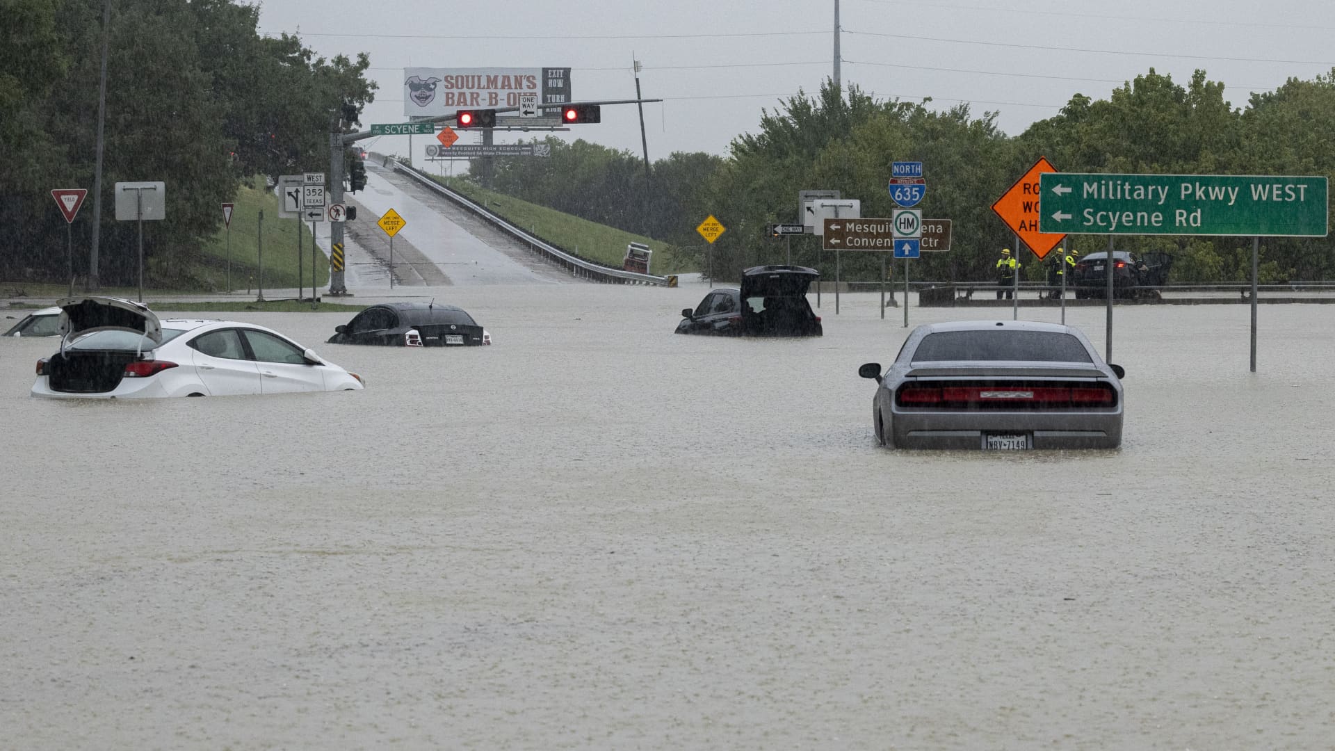 Photos: Flash flooding in Texas forces road closures and high-water rescues