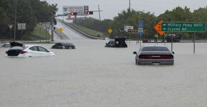 Photos: Flash flooding in Texas forces road closures and high-water rescues