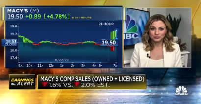 Macy's second-quarter earnings beat Wall Street's estimates; company cuts full-year forecast