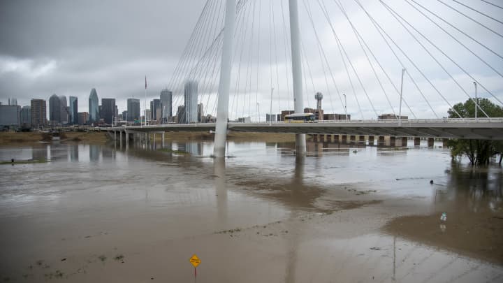 GP: Dallas Texas Flood: The Trinity River flows through a flooded area in Dallas, Texas on Monday, August 22, 2022.