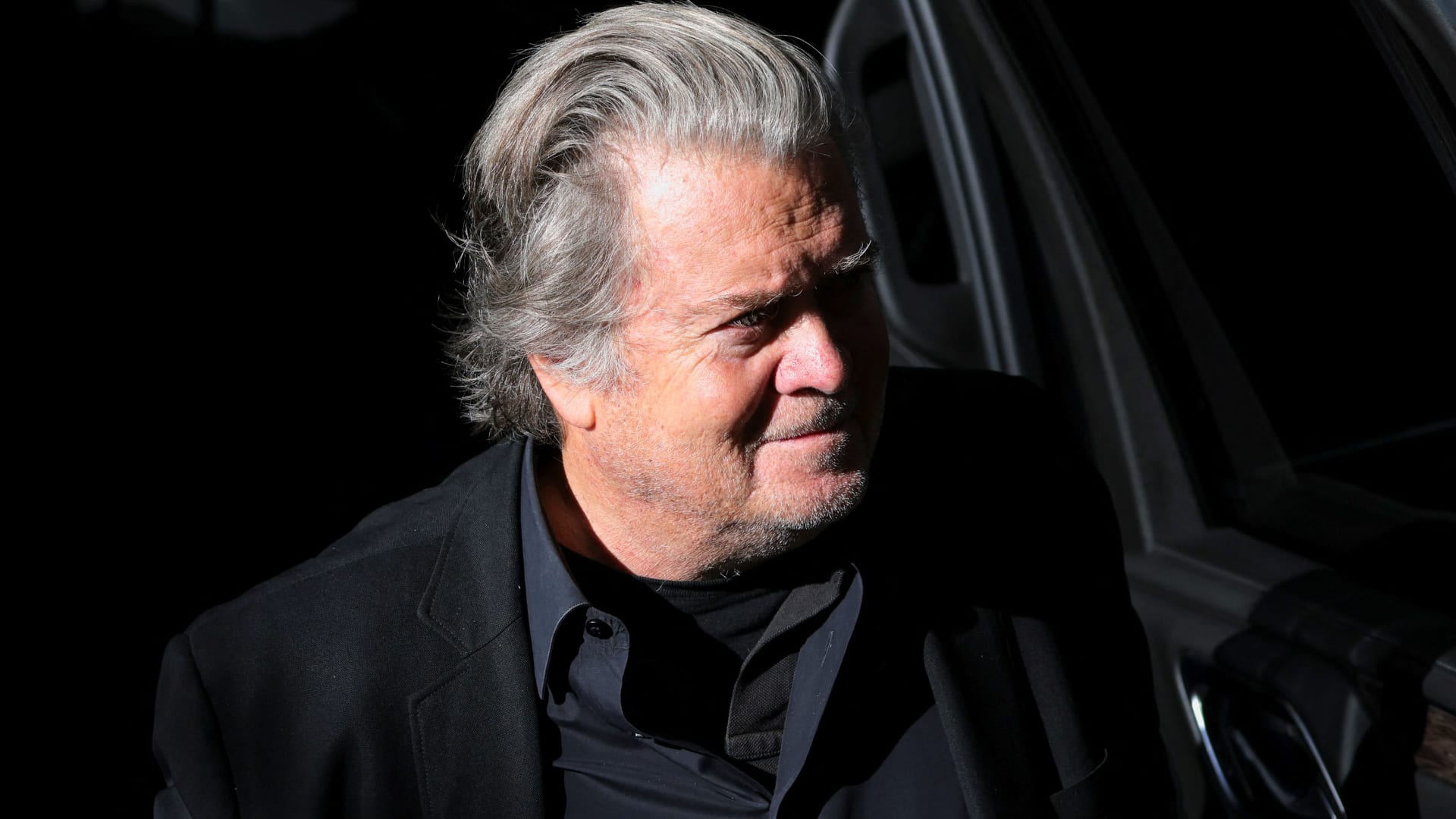 Former top Trump White House aide Steve Bannon surrenders in New York court to f..