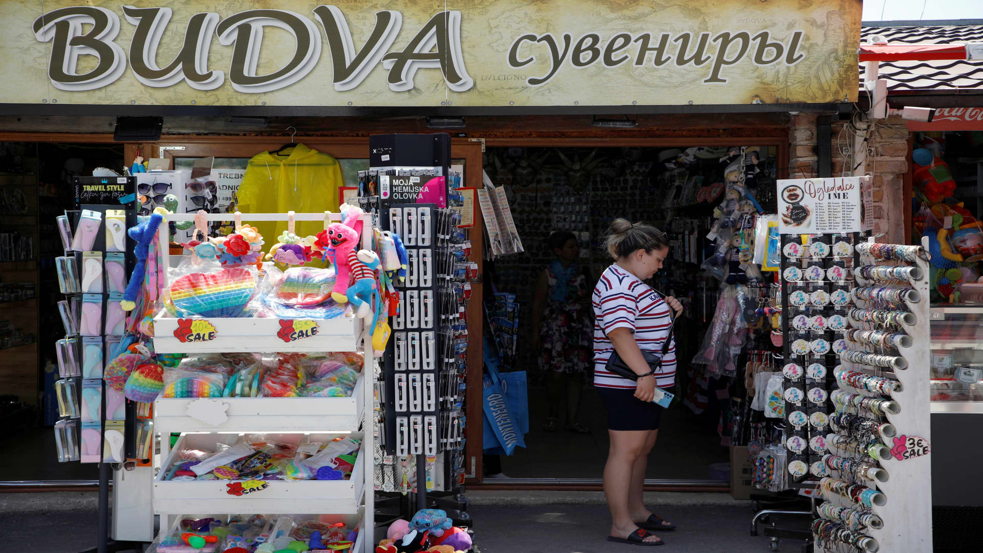 A women shop for souvenirs in Budva, the main summer tourist destination Montenegro May 24, 2022.