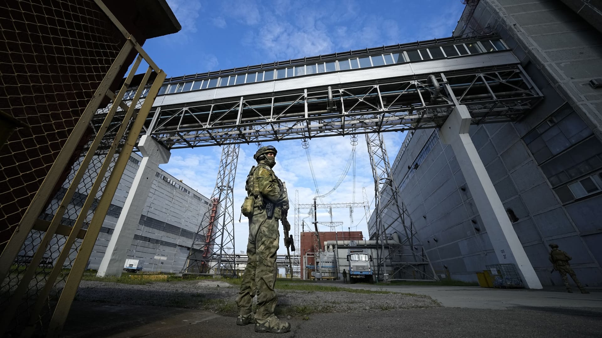 A. Russian serviceman guards an area of the Zaporizhzhia Nuclear Power Station in territory under Russian military control, southeastern Ukraine, May 1, 2022.