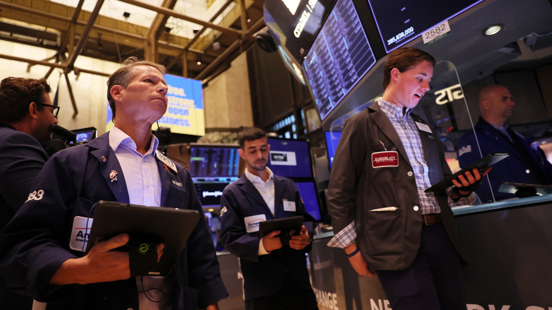 Stock futures are little changed as investors prepare for the S&P 500 to test its June low