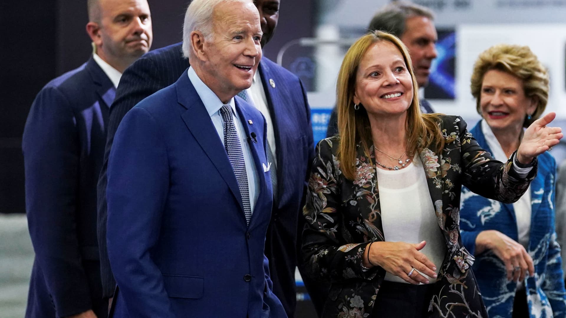 U.S. President Joe Biden listens to General Motors Chief Executive Mary Barra during a visit to the Detroit Auto Show to highlight electric vehicle manufacturing in America, in Detroit, Michigan, September 14, 2022.