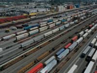 An aerial view of shipping containers and freight railway trains at the BNSF Los Angeles Intermodal Facility rail yard in Los Angeles, California, September 15, 2022.