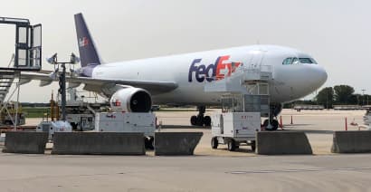 Stocks making the biggest moves midday: FedEx, Adobe, Boeing and more