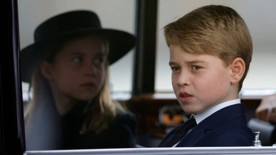 Britain's Prince George and Princess Charlotte sit in a car on the day of the state funeral and burial of Britain's Queen Elizabeth, at Westminster Abbey, in London, Britain, September 19, 2022. REUTERS/Sarah Meyssonnier/Pool      TPX IMAGES OF THE DAY
