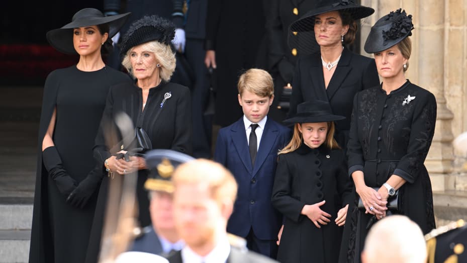LONDON, ENGLAND - SEPTEMBER 19: (L-R) Meghan, Duchess of Sussex, Camilla, Queen Consort, Prince George of Wales, Catherine, Princess of Wales, Princess Charlotte of Wales and Sophie, Countess of Wessex during the State Funeral of Queen Elizabeth II at Westminster Abbey on September 19, 2022 in London, England. Elizabeth Alexandra Mary Windsor was born in Bruton Street, Mayfair, London on 21 April 1926. She married Prince Philip in 1947 and ascended the throne of the United Kingdom and Commonwealth on 6 Febr